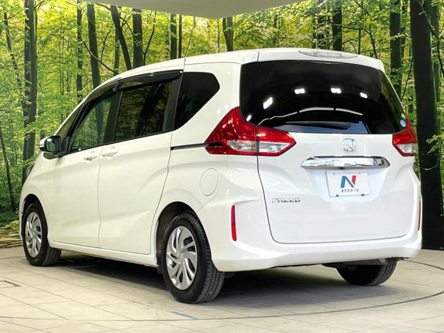 フリード Ｇ・ホンダセンシング　両側電動ドア　純正ＳＤナビ　バックカメラ　寒冷地仕様　衝突被害軽減システム　禁煙車　コーナーセンサー　スマートキー　ＬＥＤヘッド　ビルトインＥＴＣ　オートハイビーム　車線逸脱警報　オートライト（30枚目）