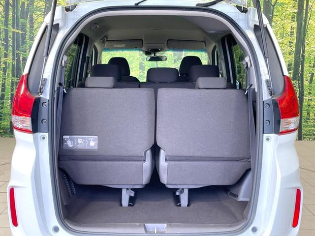 フリード Ｇ・ホンダセンシング　両側電動ドア　純正ＳＤナビ　バックカメラ　寒冷地仕様　衝突被害軽減システム　禁煙車　コーナーセンサー　スマートキー　ＬＥＤヘッド　ビルトインＥＴＣ　オートハイビーム　車線逸脱警報　オートライト（65枚目）