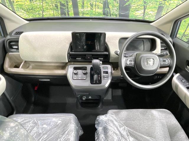 フリード エアー 登録済未使用車 両側電動ドア バックカメラ ホンダセンシング 8型ディスプレイ アダプティブクルーズ コーナーセンサー スマートキー LEDヘッド オートハイビーム オートエアコン Bluetooth(2枚目)