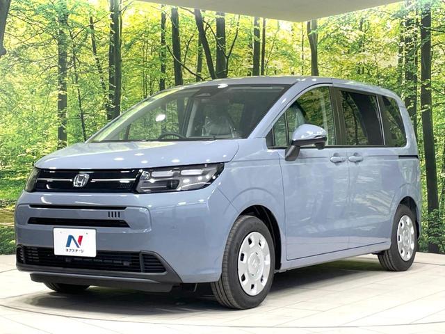 フリード エアー 登録済未使用車 両側電動ドア バックカメラ ホンダセンシング 8型ディスプレイ アダプティブクルーズ コーナーセンサー スマートキー LEDヘッド オートハイビーム オートエアコン Bluetooth(27枚目)