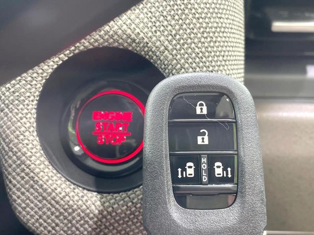 フリード エアー 登録済未使用車 両側電動ドア バックカメラ ホンダセンシング 8型ディスプレイ アダプティブクルーズ コーナーセンサー スマートキー LEDヘッド オートハイビーム オートエアコン Bluetooth(31枚目)