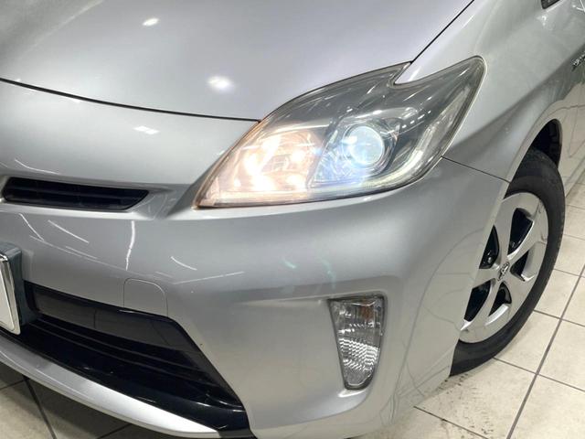 プリウス Ｓ　禁煙車　純正ナビ　バックカメラ　ＨＩＤヘッド　オートライト　オートエアコン　スマートキー　純正１５インチアルミ　横滑り防止装置　電動格納ミラー　衝突安全ボディ　盗難防止システム　ＣＤ再生　地デジ（12枚目）