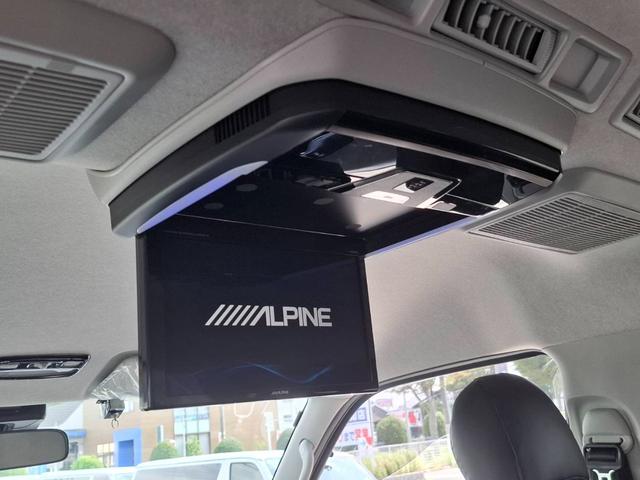 ハイエースワゴン GL 4WD/BIG-Xナビ/Bカメラ/天吊りモニタ/4列10人乗/社外アルミ/スマートキー/パワスラ/ベッドキット(3枚目)