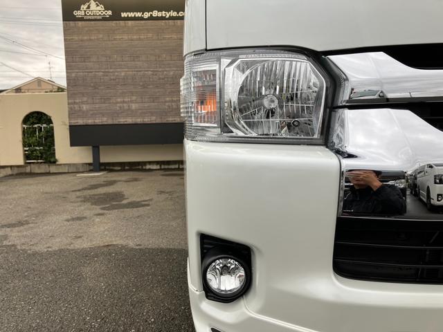 ハイエースワゴン GL 4WD/BIG-Xナビ/Bカメラ/天吊りモニタ/4列10人乗/社外アルミ/スマートキー/パワスラ/ベッドキット(13枚目)