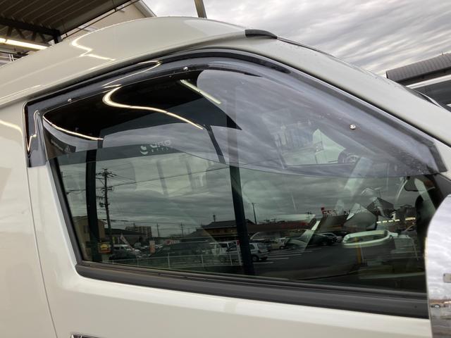 ハイエースワゴン GL 4WD/BIG-Xナビ/Bカメラ/天吊りモニタ/4列10人乗/社外アルミ/スマートキー/パワスラ/ベッドキット(28枚目)