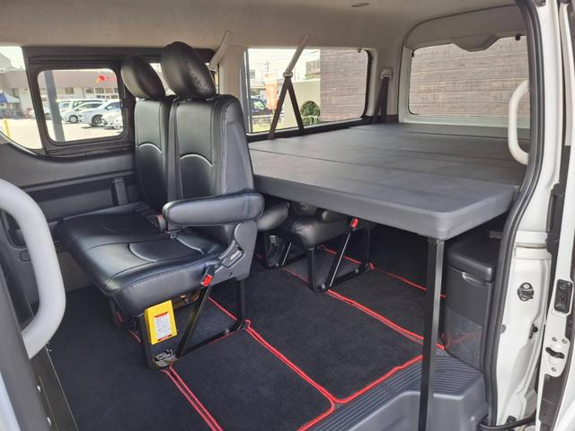 ハイエースワゴン GL 4WD/BIG-Xナビ/Bカメラ/天吊りモニタ/4列10人乗/社外アルミ/スマートキー/パワスラ/ベッドキット(57枚目)