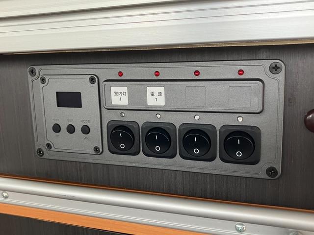 タウンエースバン GL アルトピアーノキャンパー/10inディスプレイオーディオ/ETC/バックモニター/キーレスエントリー/ネッドキット/サブバッテリー/外部電源/社外アルミ/テーブル/Wエアバック/両側スライドドア(56枚目)
