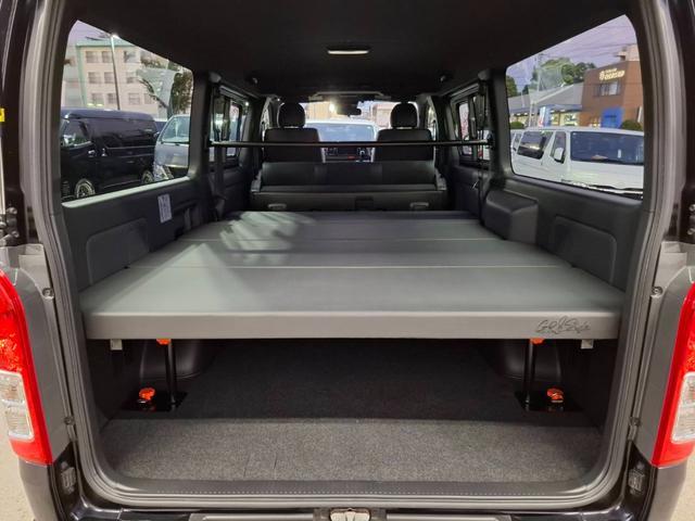 ハイエースバン スーパーGL ダークプライムII 4WD/ナビTV/ETC車載器/スマートキー&プッシュスタート/LEDヘッドライト/両側スライドドア/サイドバイザー/ダブルエアバック/トヨタセーフティセンス/ベッドキット/スライドドア小窓あり(4枚目)