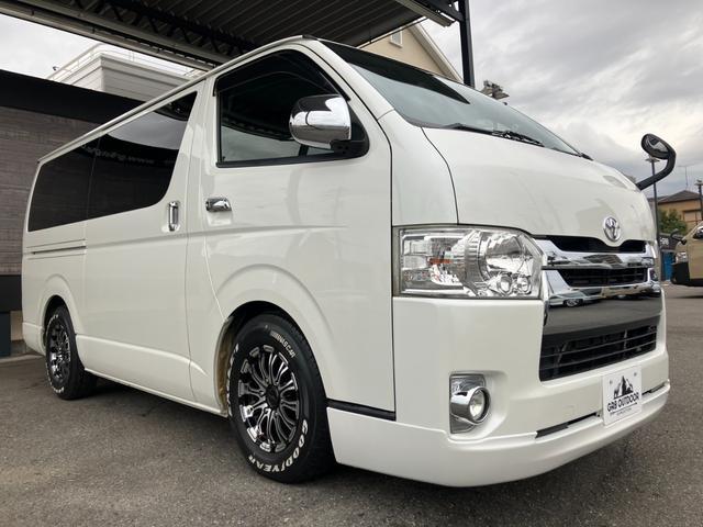 ハイエースバン ロングスーパーGL ローダウン/コブラFスポイラー/バトルシップ15inアルミ/GR8シートカバー/純正7inナビ/ETC/Bカメラ/天吊モニター/LEDテールランプ/スマートキー/ベッドキット/LEDヘッドライト(9枚目)