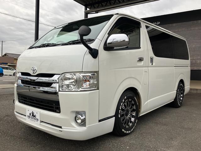 ハイエースバン ロングスーパーGL ローダウン/コブラFスポイラー/バトルシップ15inアルミ/GR8シートカバー/純正7inナビ/ETC/Bカメラ/天吊モニター/LEDテールランプ/スマートキー/ベッドキット/LEDヘッドライト(10枚目)