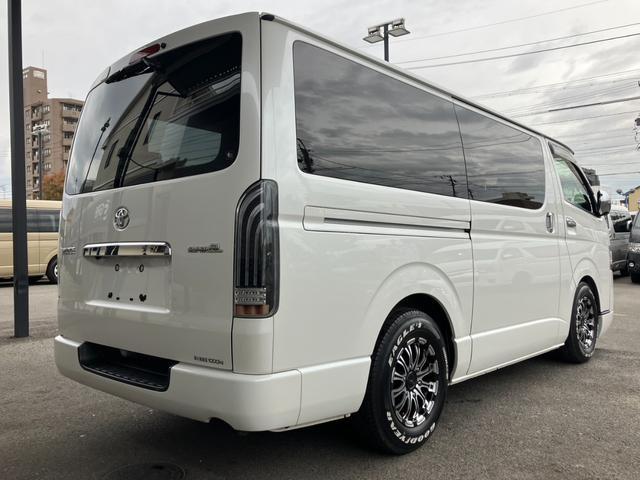 ハイエースバン ロングスーパーGL ローダウン/コブラFスポイラー/バトルシップ15inアルミ/GR8シートカバー/純正7inナビ/ETC/Bカメラ/天吊モニター/LEDテールランプ/スマートキー/ベッドキット/LEDヘッドライト(11枚目)