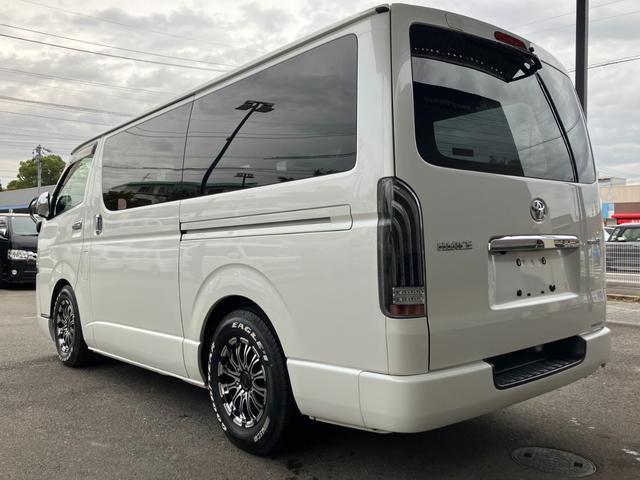 ハイエースバン ロングスーパーGL ローダウン/コブラFスポイラー/バトルシップ15inアルミ/GR8シートカバー/純正7inナビ/ETC/Bカメラ/天吊モニター/LEDテールランプ/スマートキー/ベッドキット/LEDヘッドライト(12枚目)