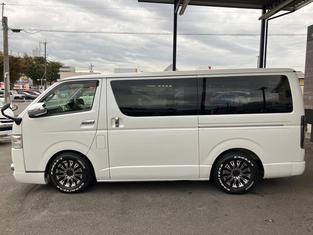 ハイエースバン ロングスーパーGL ローダウン/コブラFスポイラー/バトルシップ15inアルミ/GR8シートカバー/純正7inナビ/ETC/Bカメラ/天吊モニター/LEDテールランプ/スマートキー/ベッドキット/LEDヘッドライト(23枚目)