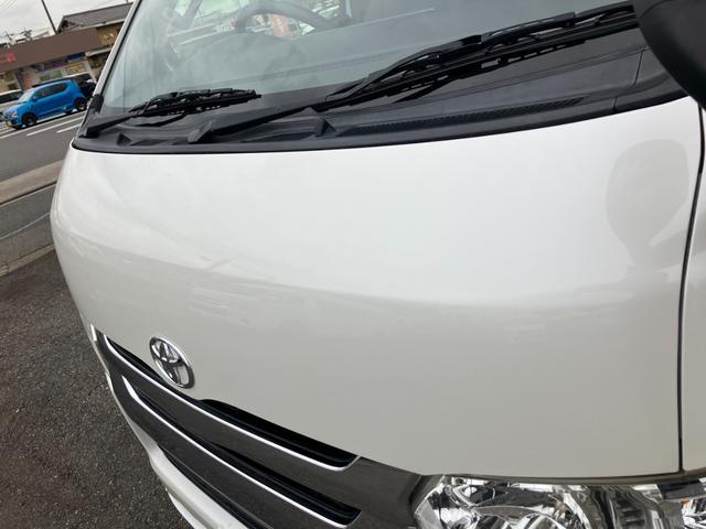 ハイエースバン ロングスーパーGL ローダウン/コブラFスポイラー/バトルシップ15inアルミ/GR8シートカバー/純正7inナビ/ETC/Bカメラ/天吊モニター/LEDテールランプ/スマートキー/ベッドキット/LEDヘッドライト(26枚目)