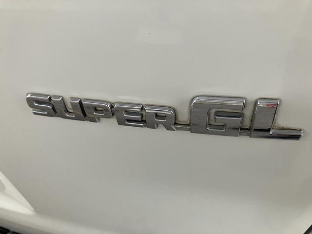 ハイエースバン ロングスーパーGL ローダウン/コブラFスポイラー/バトルシップ15inアルミ/GR8シートカバー/純正7inナビ/ETC/Bカメラ/天吊モニター/LEDテールランプ/スマートキー/ベッドキット/LEDヘッドライト(37枚目)