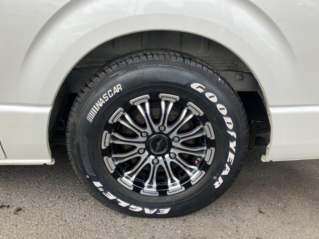 ハイエースバン ロングスーパーGL ローダウン/コブラFスポイラー/バトルシップ15inアルミ/GR8シートカバー/純正7inナビ/ETC/Bカメラ/天吊モニター/LEDテールランプ/スマートキー/ベッドキット/LEDヘッドライト(40枚目)
