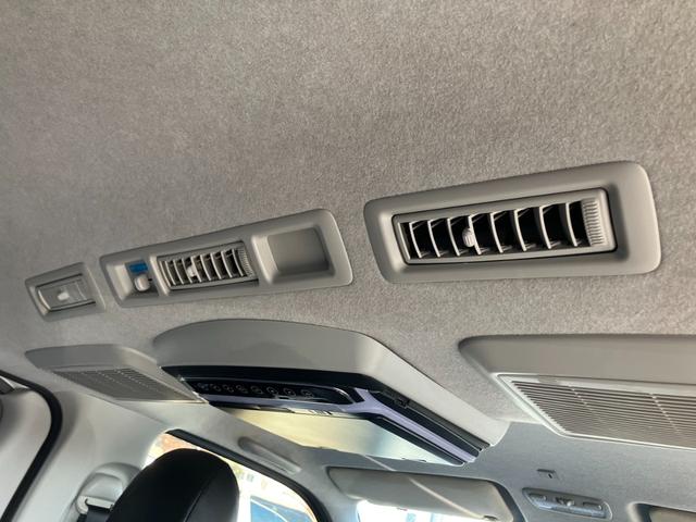 ハイエースバン ロングスーパーGL ローダウン/コブラFスポイラー/バトルシップ15inアルミ/GR8シートカバー/純正7inナビ/ETC/Bカメラ/天吊モニター/LEDテールランプ/スマートキー/ベッドキット/LEDヘッドライト(53枚目)