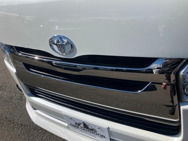 ハイエースバン スーパーGL ダークプライム 大型ナビTV/フリップダウンモニター/ETC/バックカメラ/両側パワースライドドア/スマートキー/LEDヘッドライト/AC100V/ミラーウインカー/社外アルミ/サイドバイザー/フロントスポイラ(29枚目)