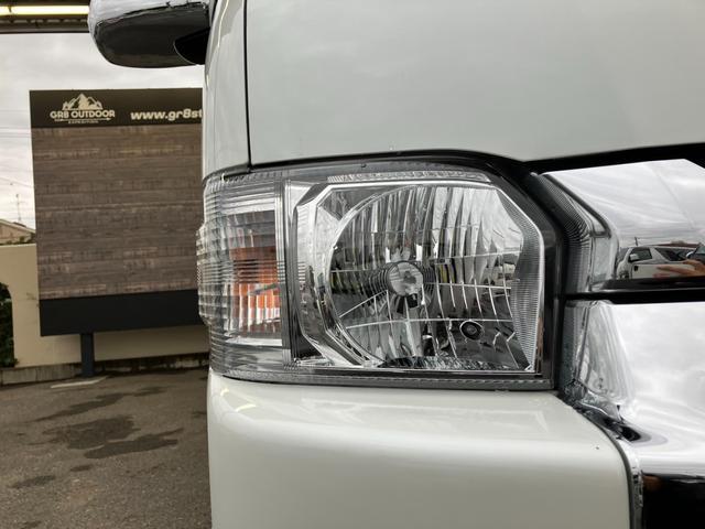 ハイエースワゴン GL 4WD/BIG-Xナビ/Bカメラ/天吊りモニタ/4列10人乗/社外アルミ/スマートキー/パワスラ/ベッドキット(30枚目)