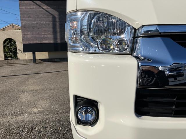 ハイエースバン ＳロングワイドＤＸ　ＧＬパッケージ　４ＷＤ／ハイルーフ５人乗／ナビＴＶ／Ｂカメラ／天吊モニタ／天井スピーカー／社外アルミ／ＧＲ８エアロ／ベッドキット（13枚目）