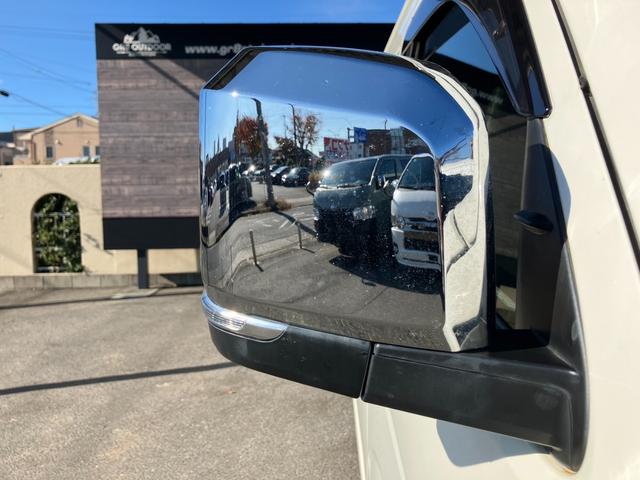 ハイエースバン ＳロングワイドＤＸ　ＧＬパッケージ　４ＷＤ／ハイルーフ５人乗／ナビＴＶ／Ｂカメラ／天吊モニタ／天井スピーカー／社外アルミ／ＧＲ８エアロ／ベッドキット（27枚目）