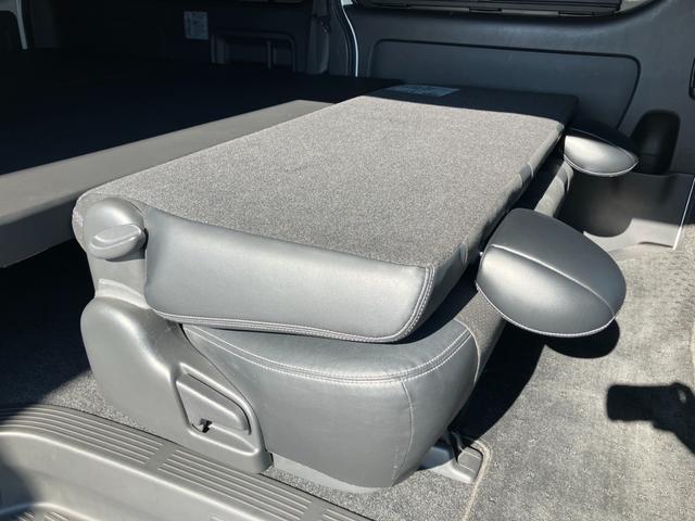 ハイエースバン ロングワイドスーパーＧＬ　ダークプライムＩＩ　１オーナー／ナビＴＶ／Ｂカメラ／ＥＴＣ／ベッドキット／モデリスタフロントスポイラー／社外アルミ／ＬＥＤヘッドライト／スマートキー＆プッシュスタート／サイドバイザー／セーフティセンス／フォグランプ（55枚目）