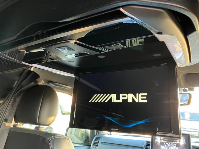 ハイエースバン スーパーGL ダークプライムII 4WD/ボディラッピングカーキ/BIG-Xナビ/天吊りモニタ/Bカメラ/サブバッテリー/ベッドキット/セカンドテーブル/社外デジタルミラー/社外アルミ/LEDヘッド/ルーフキャリア/外部電源あり(3枚目)