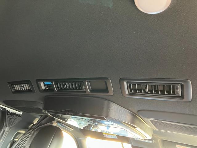 ハイエースバン スーパーGL ダークプライムII 4WD/ボディラッピングカーキ/BIG-Xナビ/天吊りモニタ/Bカメラ/サブバッテリー/ベッドキット/セカンドテーブル/社外デジタルミラー/社外アルミ/LEDヘッド/ルーフキャリア/外部電源あり(51枚目)