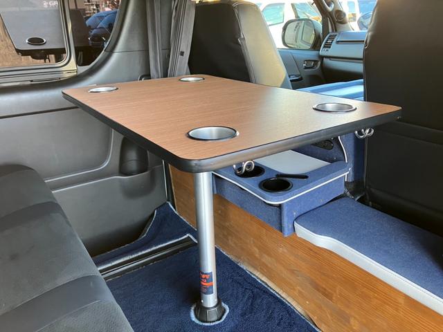 ハイエースバン スーパーGL ダークプライムII 4WD/ボディラッピングカーキ/BIG-Xナビ/天吊りモニタ/Bカメラ/サブバッテリー/ベッドキット/セカンドテーブル/社外デジタルミラー/社外アルミ/LEDヘッド/ルーフキャリア/外部電源あり(53枚目)