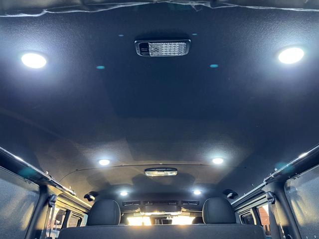 ハイエースバン スーパーGL ダークプライムII 4WD/ボディラッピングカーキ/BIG-Xナビ/天吊りモニタ/Bカメラ/サブバッテリー/ベッドキット/セカンドテーブル/社外デジタルミラー/社外アルミ/LEDヘッド/ルーフキャリア/外部電源あり(58枚目)