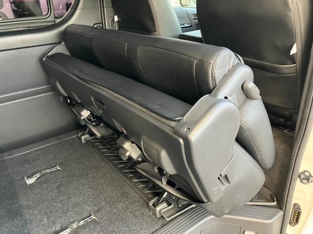 ハイエースバン スーパーＧＬ　ダークプライムＩＩ　ＢＩＧ－Ｘナビ／Ｂカメラ／／ＥＴＣ／ベッドキット／社外センターコンソール／ＬＥＤヘッドライト／スマートキー＆プッシュスタート／サイドバイザー／社外シートカバー／セーフティセンス／ＡＣ１００Ｖ電源（56枚目）