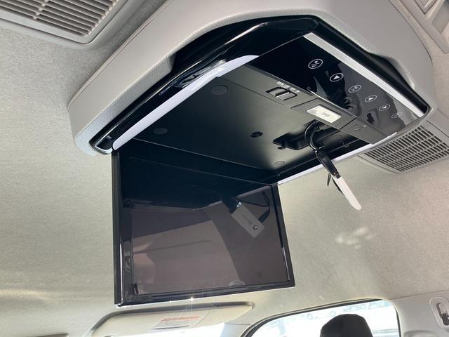 ハイエースバン ＳロングワイドＤＸ　ＧＬパッケージ　４ＷＤ／ハイルーフ５人乗／ナビＴＶ／Ｂカメラ／天吊モニタ／天井スピーカー／社外アルミ／ＧＲ８エアロ／ベッドキット（3枚目）
