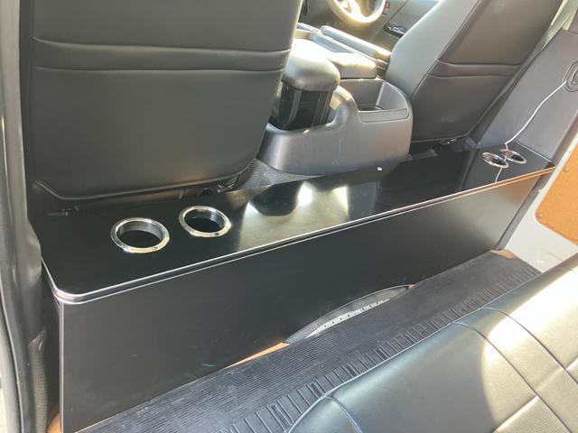 ハイエースバン ＳロングワイドＤＸ　ＧＬパッケージ　４ＷＤ／ハイルーフ５人乗／ナビＴＶ／Ｂカメラ／天吊モニタ／天井スピーカー／社外アルミ／ＧＲ８エアロ／ベッドキット（55枚目）