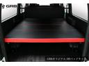 スーパーロングワイドＤＸ　４ＷＤ／大型ナビＴＶ／フリップダウンモニター／ＥＴＣ／アラウンドビューモニター／デジタルインナーミラー／ベッドキット／社外アルミ／ＬＥＤヘッドライト／キーレスエントリー／ハイルーフ（27枚目）