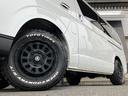 ハイエースバン ロングスーパーGL 4WD/ベッド/丸目ヘッドライトキット/社外グリル/新品バトルシップネオAW/RTタイヤ/7inナビ/ETC/GR8クラシックシートカバー/トヨタセーフティセンス/Wエアバッグ/キャンピングカー 中古車画像_2