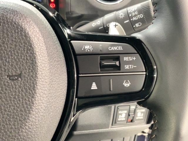 Ｎ－ＢＯＸカスタム ターボ　Ｈ　ＳＥＮＳＩＮＧ　新車保証　試乗禁煙車　ナビＶＸＭ－２４５ＺＦＥｉ　リヤカメラ　ＢＴオ－ディオ　シ－トヒ－タ－　ＥＴＣ　両側電動ドア　フォグライト　ＴＶ　ＬＥＤライト　クルコン　アルミ　車線逸脱（11枚目）