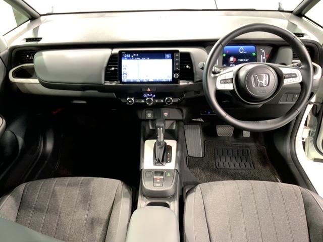 フィット e:HEVホーム H SENSING 新車保証 試乗禁煙車  9inchナビLXM-242ZFNi フルセグ リヤカメラ BTオ-ディオ ETC LEDライト サイドエアバッグ クルコン USB CarPlay(9枚目)