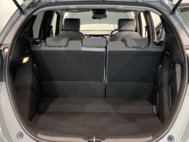 フィット ｅ：ＨＥＶＲＳ　Ｈ　ＳＥＮＳＩＮＧ　新車保証　試乗禁煙車　ナビＬＸＭ－２４２ＺＦＮｉ　フルセグＴＶ　リヤカメラ　ＢＴオ－ディオ　ＤＶＤ　ＣａｒＰｌａｙ　ＥＴＣ　ＬＥＤライト　クルコン　アルミ　サイドエアバッグ（38枚目）