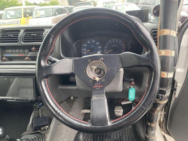 ジムニー ＸＣ　グー故障診断実施済み／車両状態評価書／５速マニュアル車／リフトアップ／ターボ／４ＷＤ⇔２ＷＤ切り替え式／キーレス／ナビ　社外メーター／ロールバー／運転席バケットシート／社外ヘッドライト（15枚目）