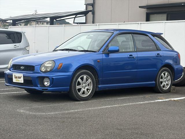 インプレッサスポーツワゴン 20N 5MT 4WD タイベル交換済 ETC キーレス 純正オーディオ MOMOステアリング 電動格納ミラー プロジェクターヘッドライト フロントフグランプ 純正アルミホイール(4枚目)