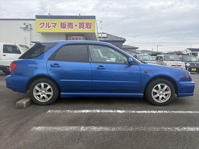 インプレッサスポーツワゴン 20N 5MT 4WD タイベル交換済 ETC キーレス 純正オーディオ MOMOステアリング 電動格納ミラー プロジェクターヘッドライト フロントフグランプ 純正アルミホイール(9枚目)