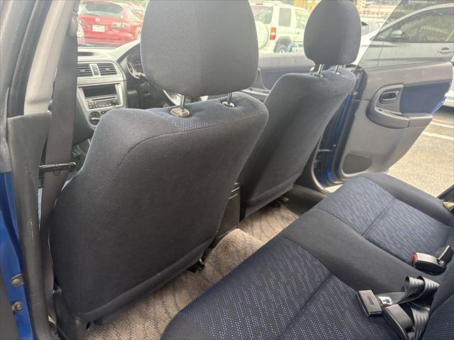 インプレッサスポーツワゴン 20N 5MT 4WD タイベル交換済 ETC キーレス 純正オーディオ MOMOステアリング 電動格納ミラー プロジェクターヘッドライト フロントフグランプ 純正アルミホイール(35枚目)