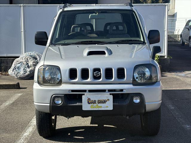 ジムニー ＸＣ　５ＭＴ　ターボ　４ＷＤ　社外オーディオ　ＡＭ　ＦＭ　ＣＤ　ハロゲンヘッドライト　フロントフォグランプ　エアコン　エアバック　パワーウィンドウ　純正アルミホイール　パワーステアリング（3枚目）