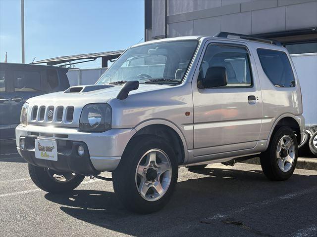 ジムニー ＸＣ　５ＭＴ　ターボ　４ＷＤ　社外オーディオ　ＡＭ　ＦＭ　ＣＤ　ハロゲンヘッドライト　フロントフォグランプ　エアコン　エアバック　パワーウィンドウ　純正アルミホイール　パワーステアリング（4枚目）