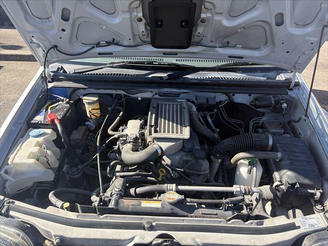 ジムニー ＸＣ　５ＭＴ　ターボ　４ＷＤ　社外オーディオ　ＡＭ　ＦＭ　ＣＤ　ハロゲンヘッドライト　フロントフォグランプ　エアコン　エアバック　パワーウィンドウ　純正アルミホイール　パワーステアリング（39枚目）