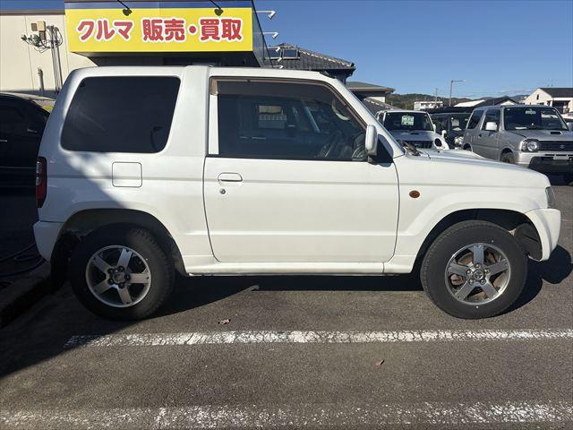 パジェロミニ ＶＲ　４ＷＤ　ＡＴ　ターボ　タイベル交換済　キーレス　Ｂｌｕｅｔｏｏｔｈオーディオ　ハロゲンヘッドライト　フロントフォグランプ　電動格納ミラー　純正アルミホイール　エアコン　エアバック（9枚目）