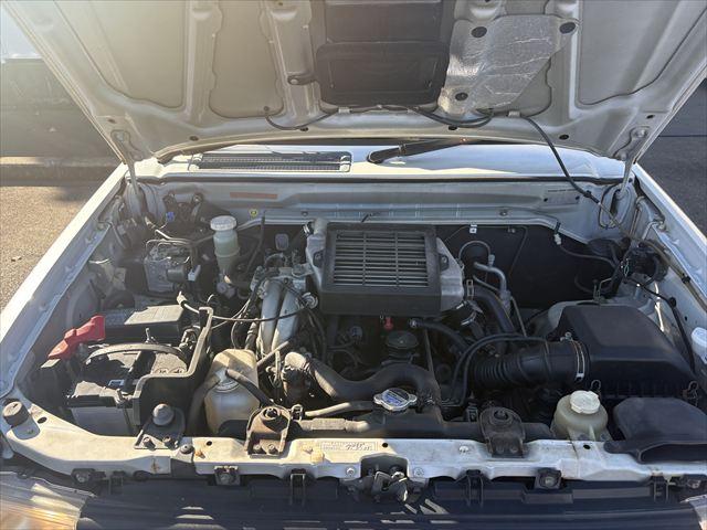 パジェロミニ ＶＲ　４ＷＤ　ＡＴ　ターボ　タイベル交換済　キーレス　Ｂｌｕｅｔｏｏｔｈオーディオ　ハロゲンヘッドライト　フロントフォグランプ　電動格納ミラー　純正アルミホイール　エアコン　エアバック（27枚目）