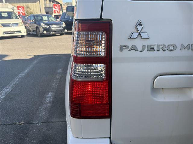 パジェロミニ ＶＲ　４ＷＤ　ＡＴ　ターボ　タイベル交換済　キーレス　Ｂｌｕｅｔｏｏｔｈオーディオ　ハロゲンヘッドライト　フロントフォグランプ　電動格納ミラー　純正アルミホイール　エアコン　エアバック（33枚目）