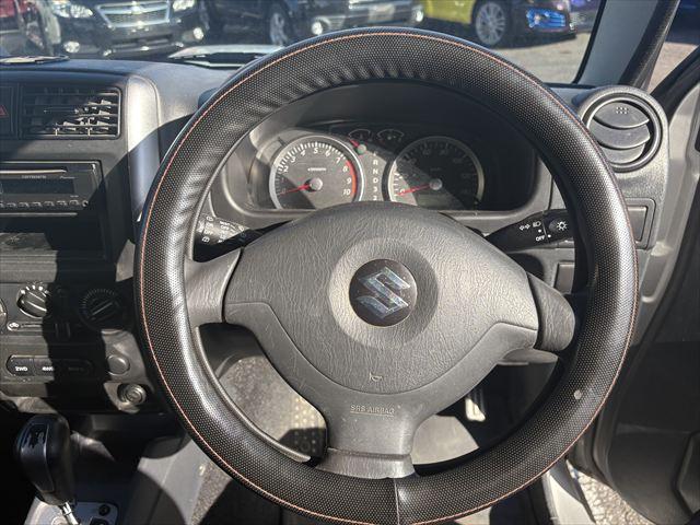 ジムニー ＸＧ　４ＷＤ　ターボ　ＡＴ　オーディオ　ヘットライトレベライザー　パワーウィンドウ　シートヒーター　エアバック　エアコン　社外アルミホイール（14枚目）