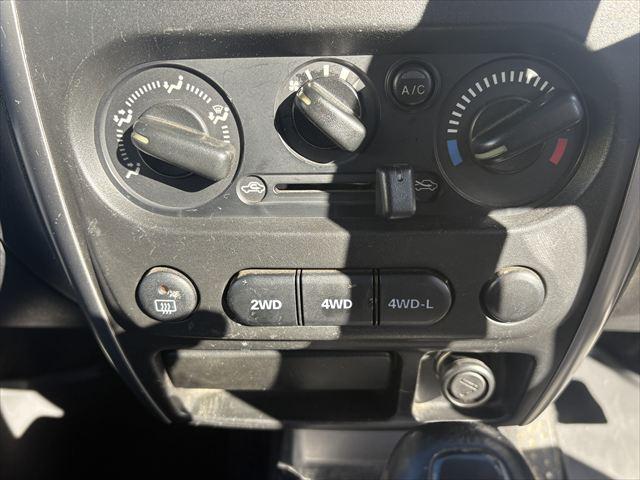 ジムニー ＸＧ　４ＷＤ　ターボ　ＡＴ　オーディオ　ヘットライトレベライザー　パワーウィンドウ　シートヒーター　エアバック　エアコン　社外アルミホイール（20枚目）